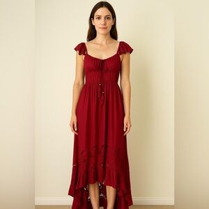 Long dress with embroidery on the bottom.